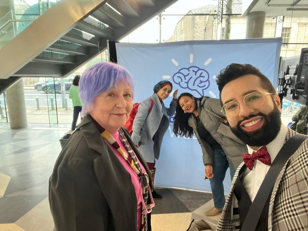 Welcome backdrop — With fellow delegates at the Creative Brain Week wall